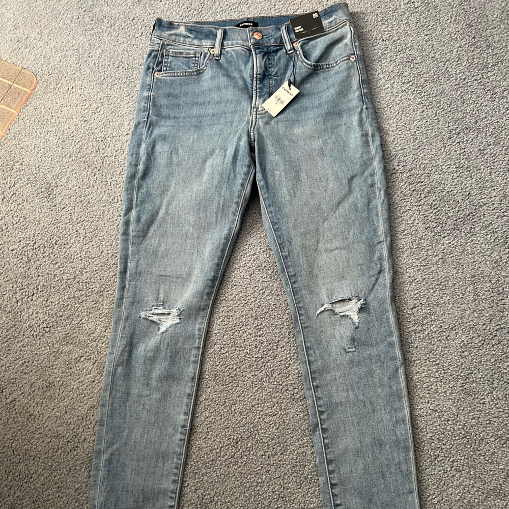NWT - Express Raw edge midrise distressed skinny jeans! Soo cute and trendy!